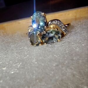 2+ cts nat. Tanzanite in 10k with diamond accents